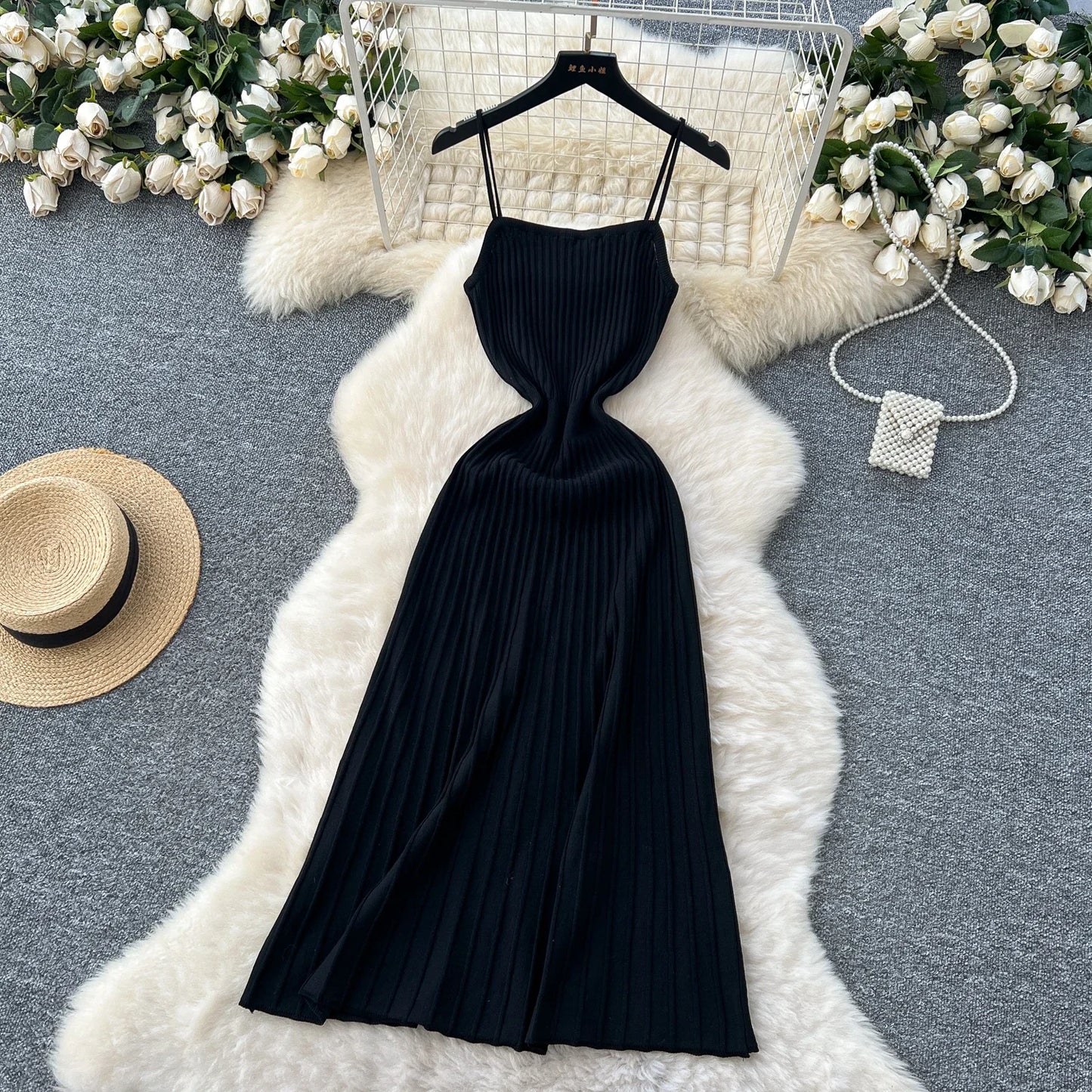Vestido midi, caimento fluído,  em tricô  modelo feminino  casual elegante super versátil.