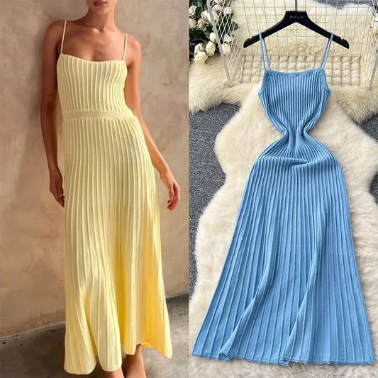 Vestido midi, caimento fluído,  em tricô  modelo feminino  casual elegante super versátil.