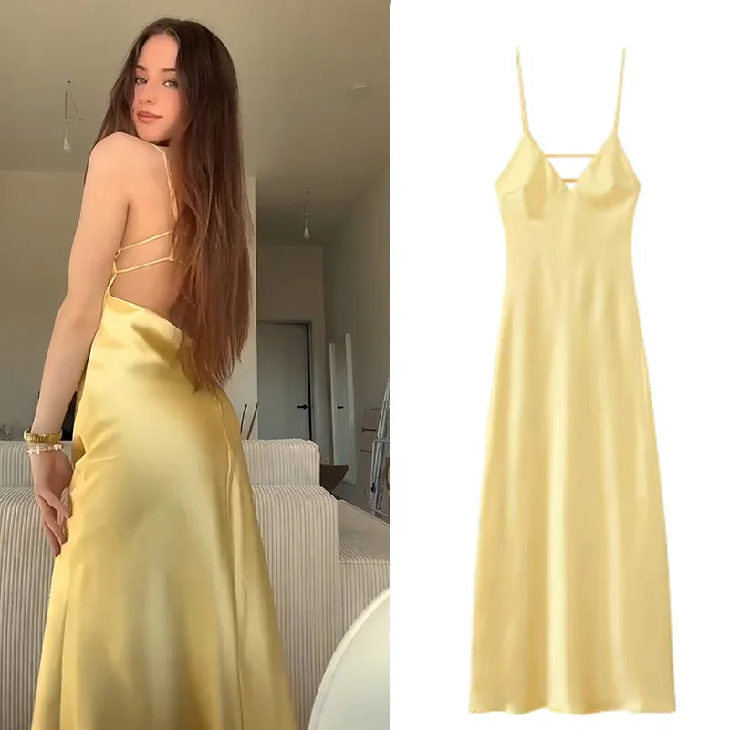 Vestido modelo sensual amarelo  decote nas costas longo pode ser usado em várias ocasiões .